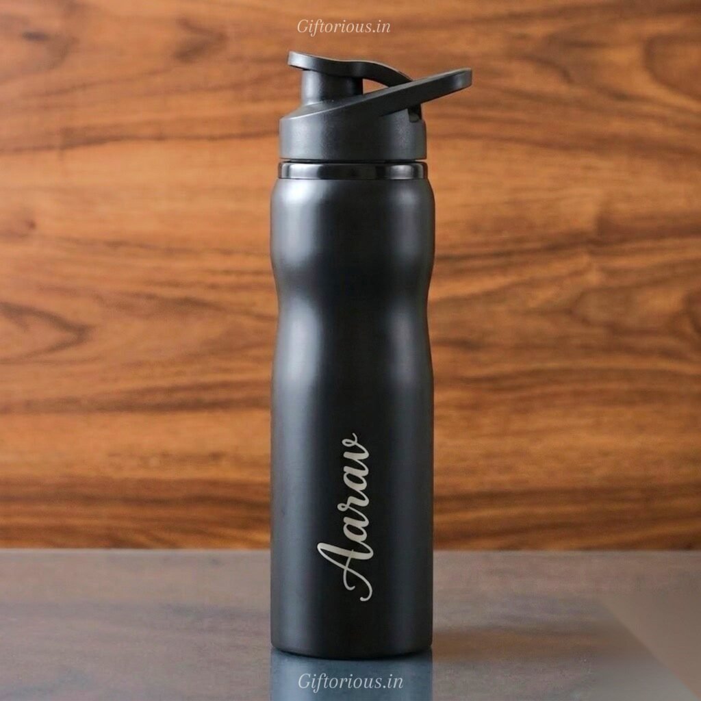 Black custom water bottle with printed name